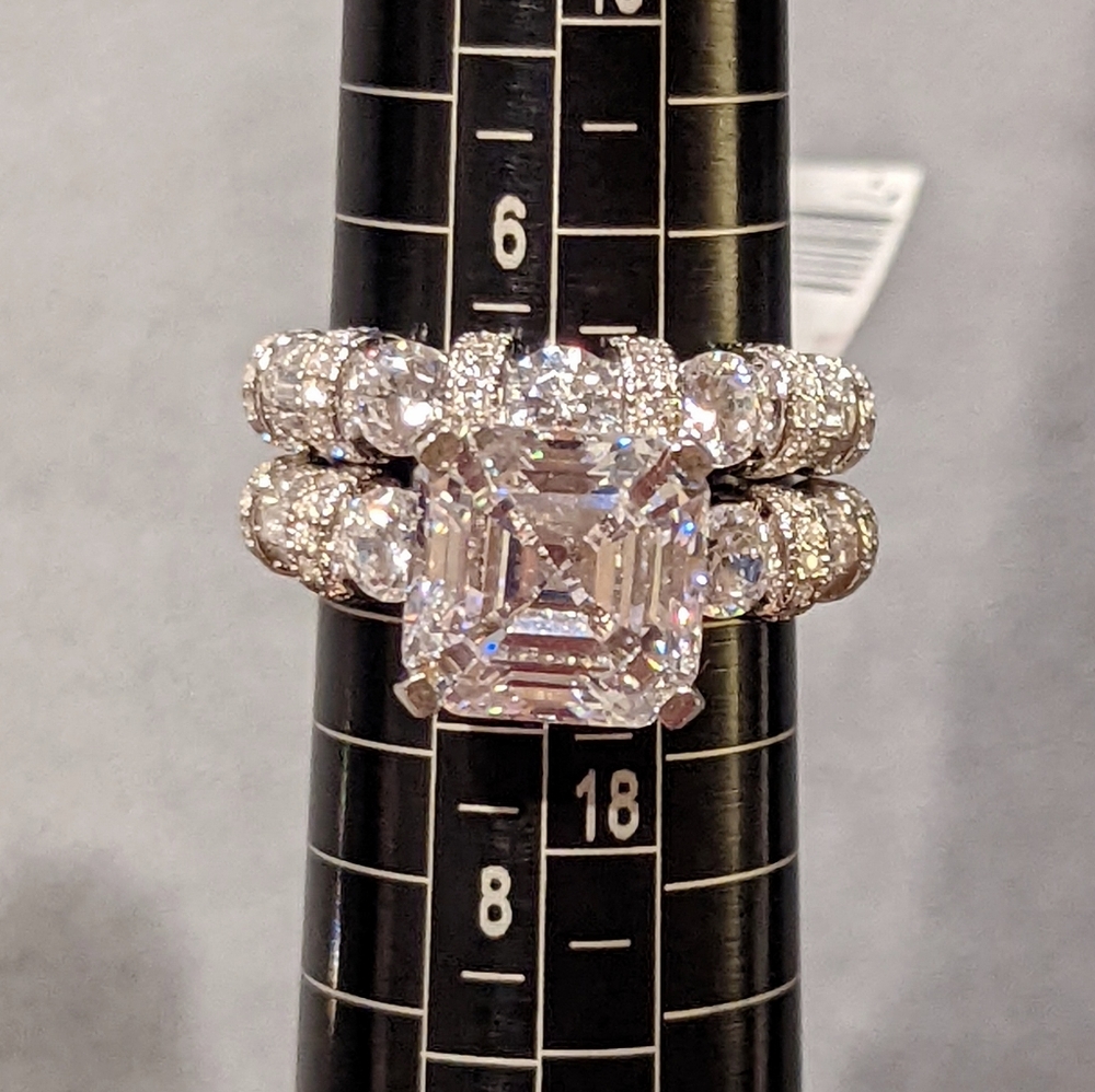 Set of two, Asscher cut cubic zirconia engagement ring and wedding band.